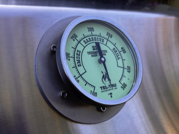 Installed a new thermometer on outdoor grill. The original thermometer was no longer available so I was able to get stainless steel machined to cover the old hole and install the new thermometer.